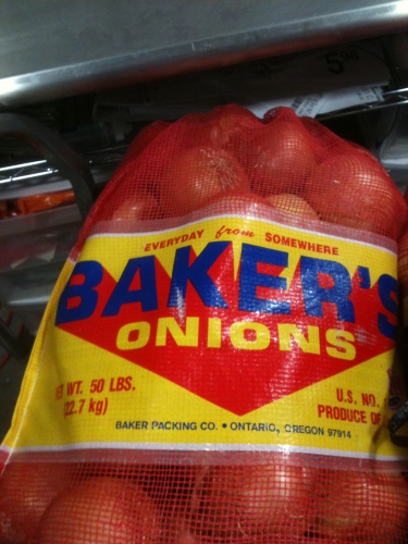 Photo of a large red bag of Baker's Onions with the tagline Everyday From Somewhere